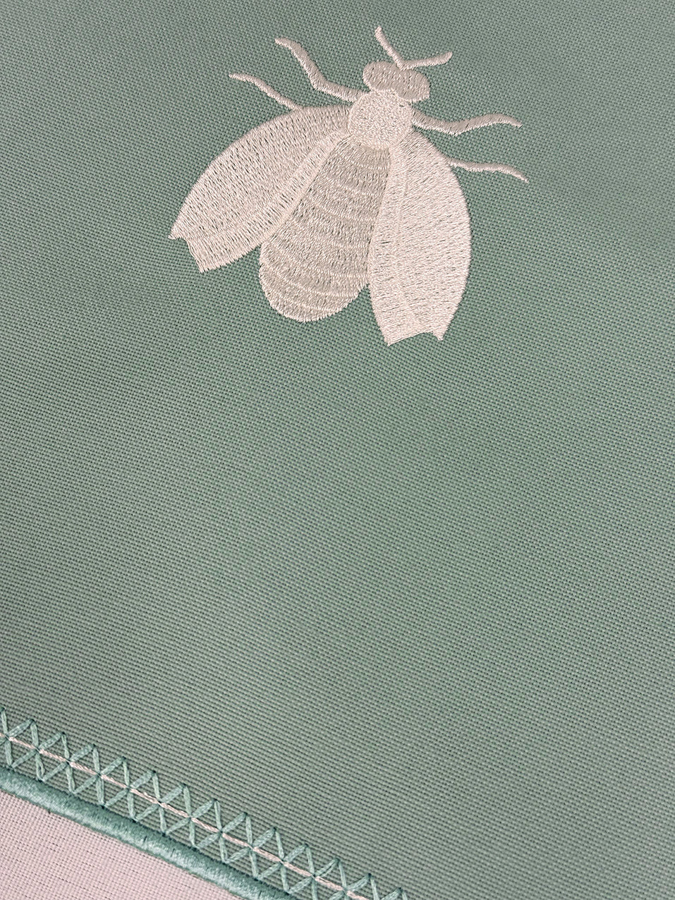 Embroidered Honey Bee placemat in Duck Egg Blue, Set of 4
