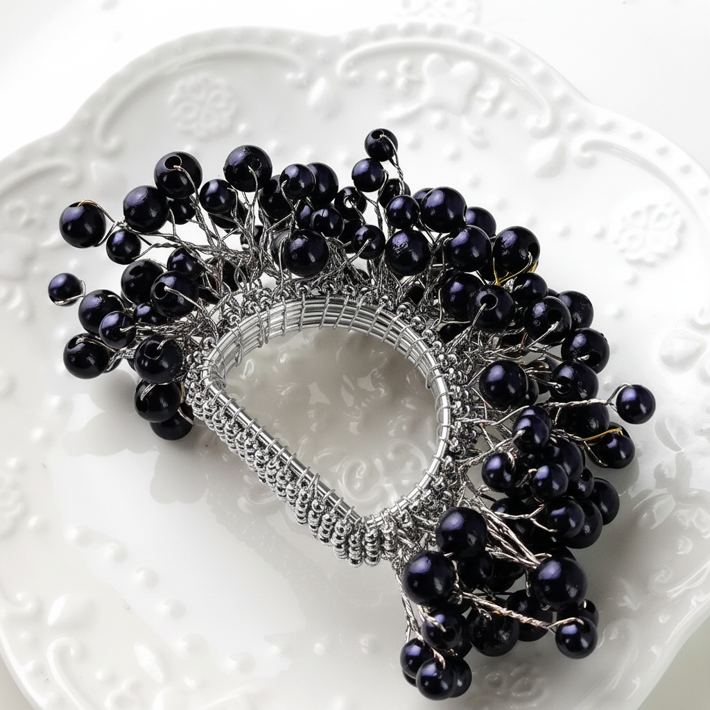 Midnight Napkin Ring in Silver or Gold.