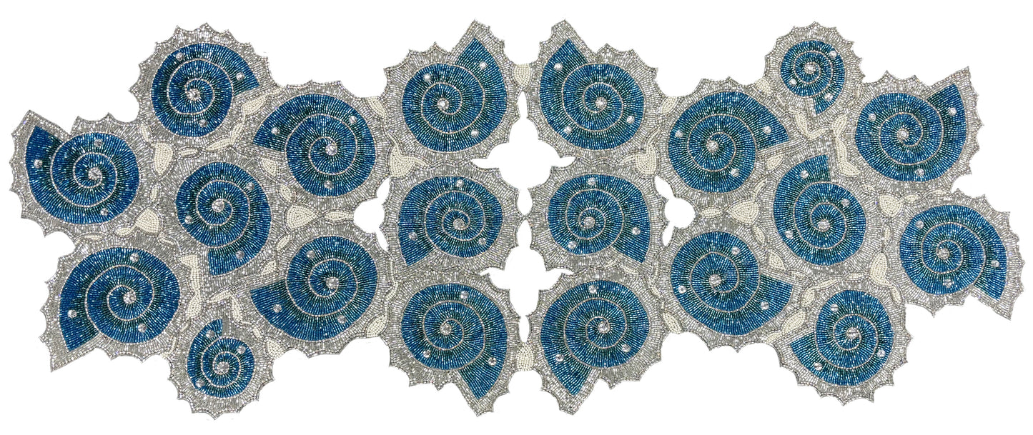 Elegant table setting with decorative blue handmade beaded table runner with silver and blue glass beads and rhinestones