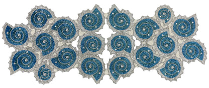 Elegant table setting with decorative blue handmade beaded table runner with silver and blue glass beads and rhinestones