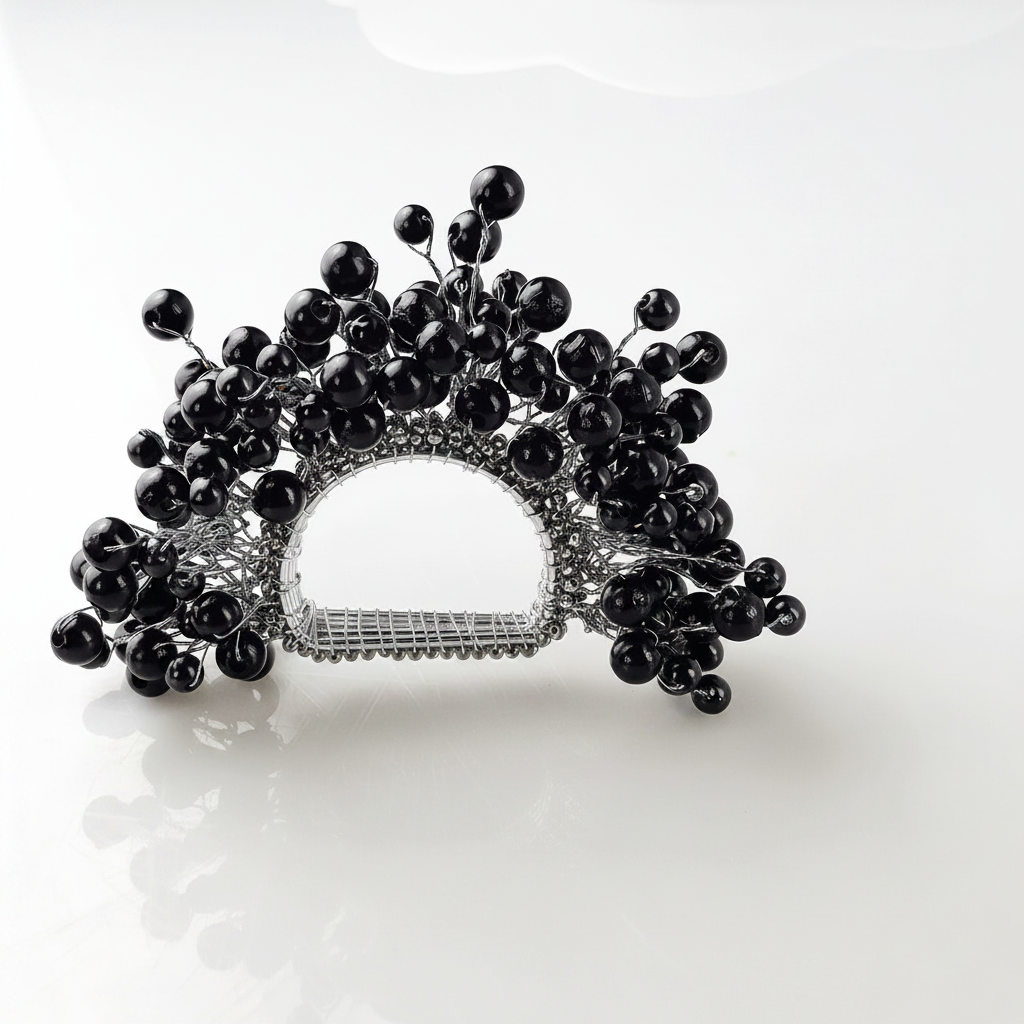 Midnight Napkin Ring in Silver or Gold.