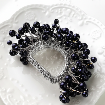 Midnight Napkin Ring in Silver or Gold.